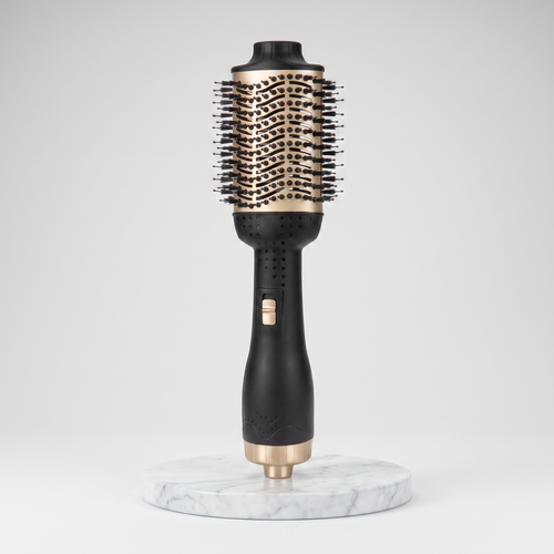 Hot air brush anti-frizz straightener in black and gold on a marble pedestal