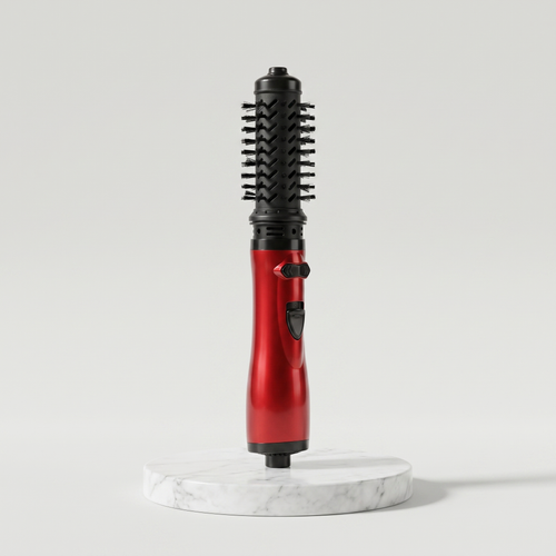 Rotating hot air brush hair styler in red on a marble pedestal