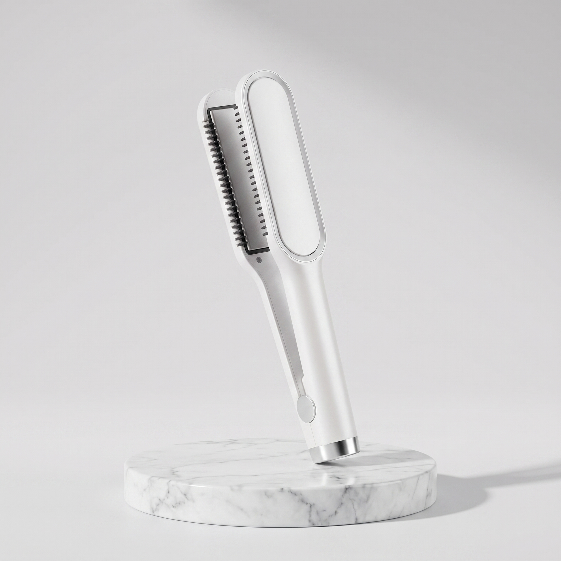 2-in-1 ceramic hair straightener brush in white on a marble pedestal