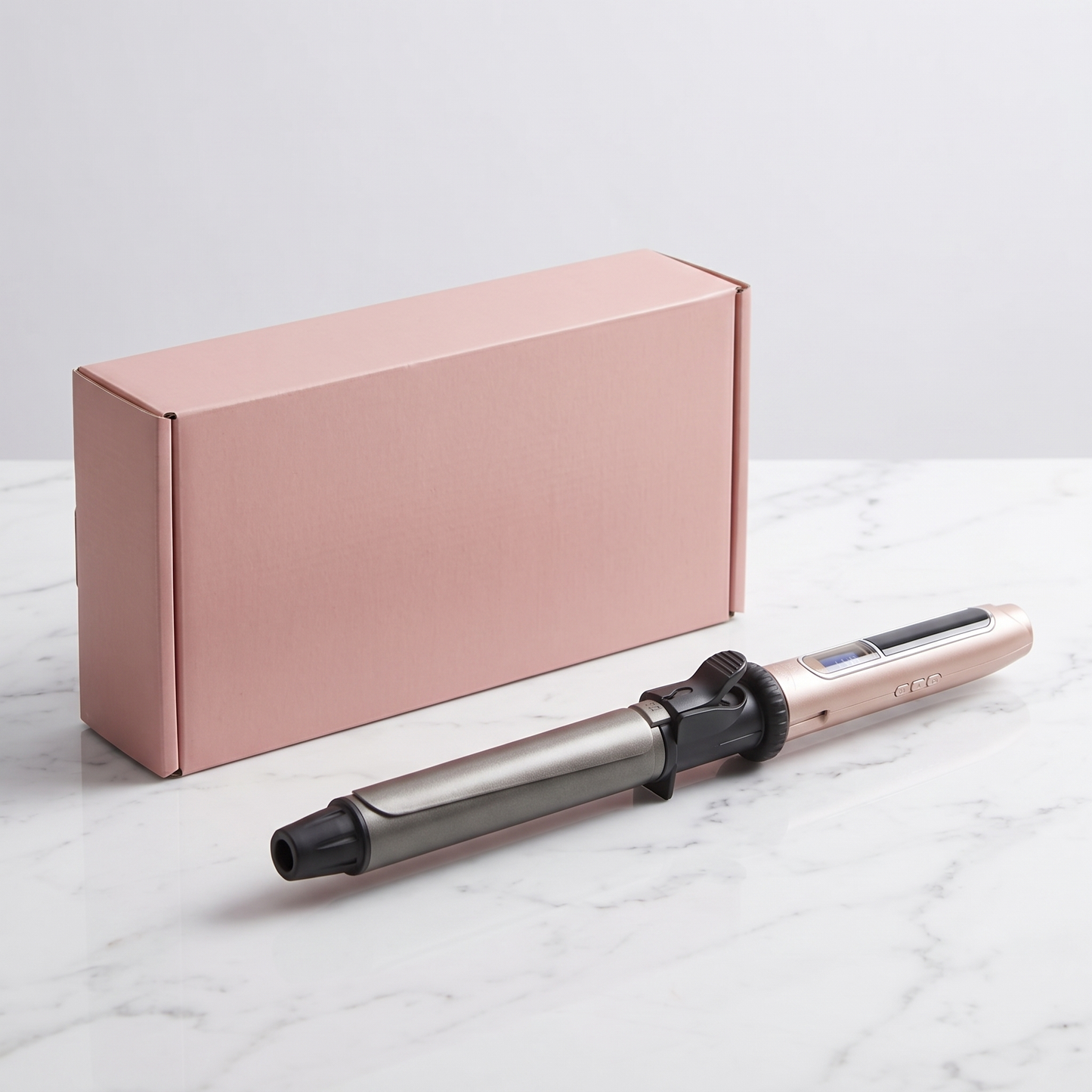 Professional rotating curling iron with plain pink retail box