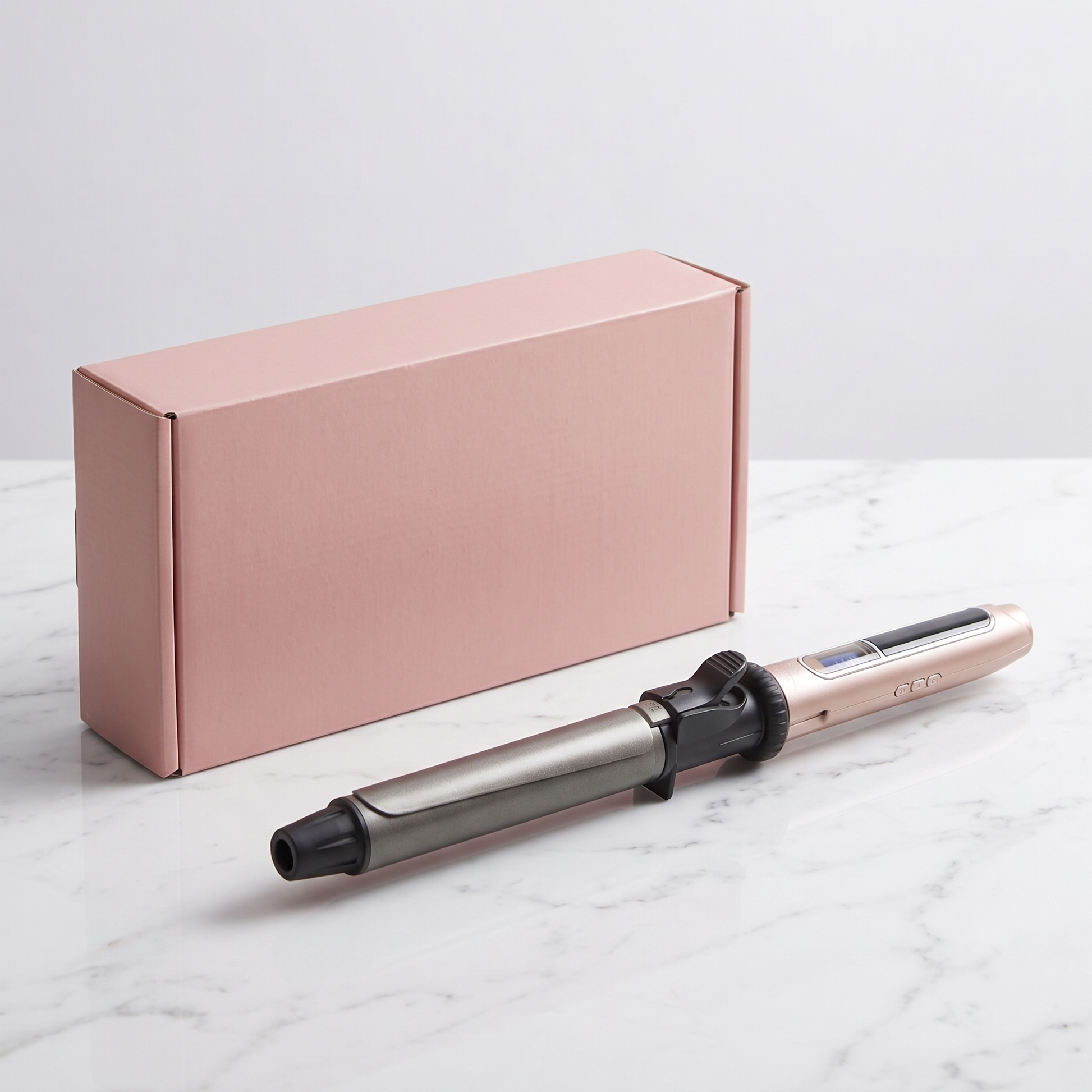Professional rotating curling iron with plain pink retail box