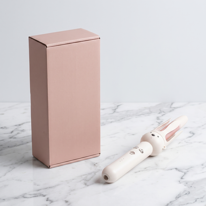 Automatic hair curler with plain pink retail box